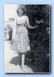 On her wedding day with Father Frank and Mother Ella 